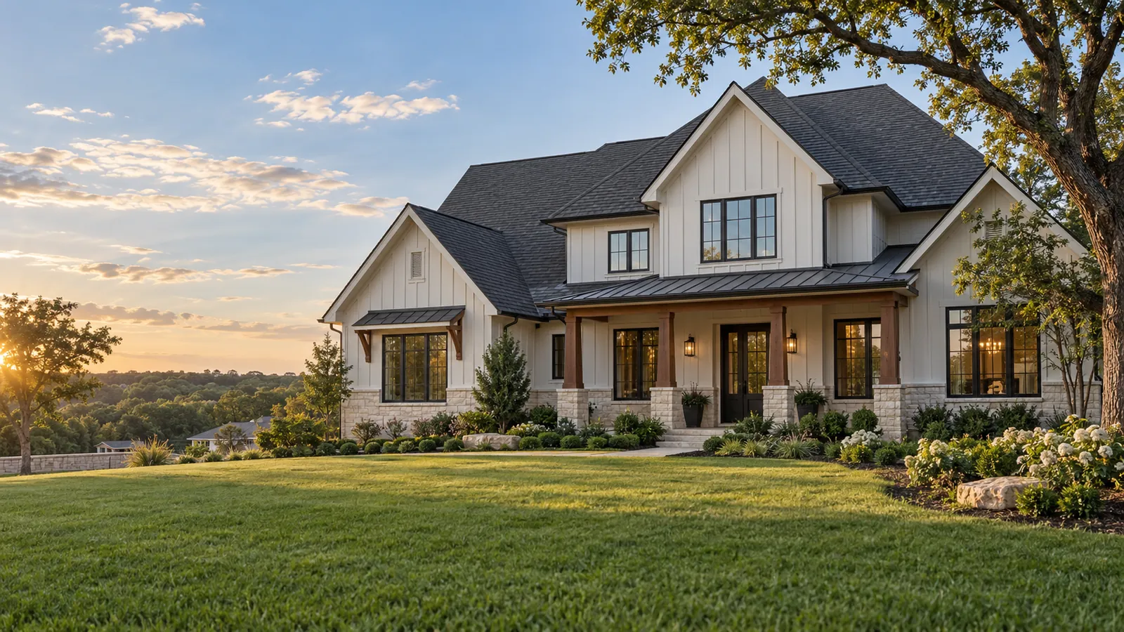 A craftsman home with a new charcoal architectural shingle roof at golden hour